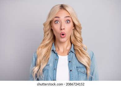 Photo Of Impressed Shocked Young Woman Dressed Denim Shirt Big Eyes Isolated Grey Color Background