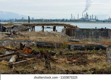 Photo of Industrial Wasteland with manufacturing plant in background.