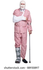 Photo Of An Injured Man Walking On Crutches, Isolated On A White Background.