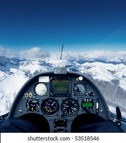 Photo Inside The Cockpit Of A Glider Flying Over The Alps