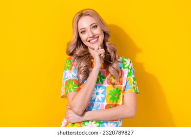 Photo of interested lady worker hold arm chin have brilliant smart business idea wear floral shirt isolated yellow color background - Shutterstock ID 2320789827