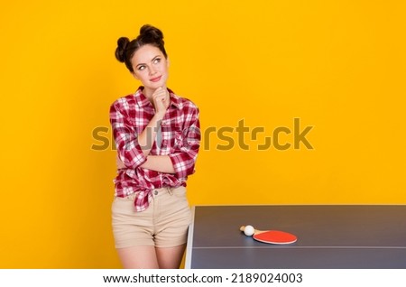Photo of interested sportswoman lady decide winning table tennis match strategy isolated vibrant color background