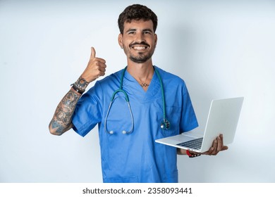 Photo of interested young caucasian doctor man wearing blue medical uniform hold telephone look side empty space screen - Powered by Shutterstock