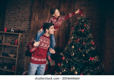 Photo of joyful happy daughter father family put star christmas tree enjoy smile inside house home apartment
