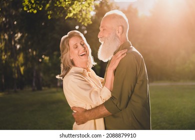 Photo of joyful happy old retired couple dance good mood sunny weather day enjoy weekend outside outdoors in park - Shutterstock ID 2088879910