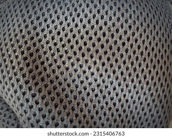 photo of a knitted fabric texture with very fine pores and fibers - Shutterstock ID 2315406763