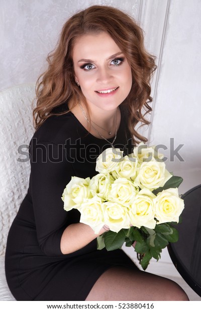 black dress with white roses