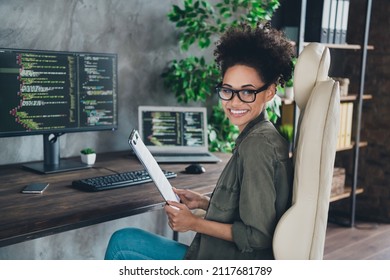 Photo of lady editor sit desk hold check list support operating system start-up development report in workplace workstation