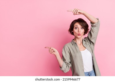 Photo of lady promoter impressed unbelievable promotion point empty space index finger isolated pastel color background