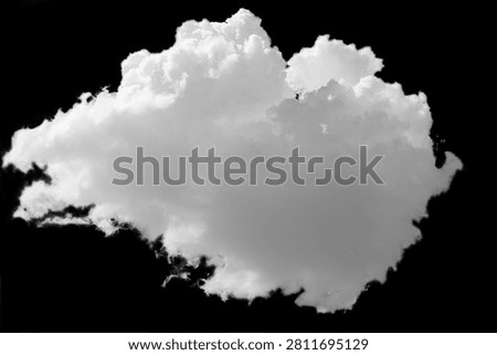 Photo of a large cloud with highlights and shadows, isolated on a black background with clipped path and transitions. Blank for artworks.