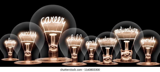 Photo of light bulb with shining fibers in shapes of CAREER concept related words isolated on black background