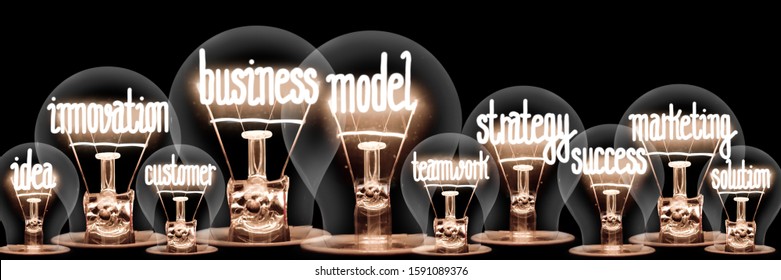 Photo of light bulbs with shining fibers in a shape of Business Model, Innovation, Strategy and Marketing concept related words isolated on black background - Shutterstock ID 1591089376