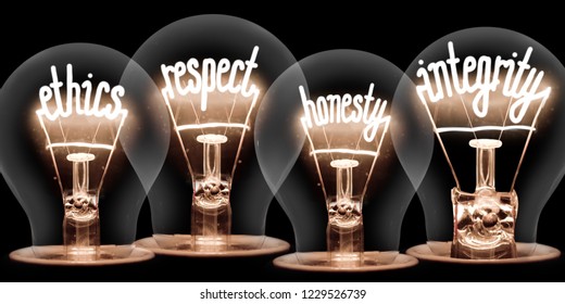 Photo of light bulbs with shining fibres in ETHICS, RESPECT, HONESTY and INTEGRITY shape isolated on black background - Shutterstock ID 1229526739