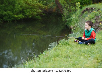 Photo Of Little Boy Fishing