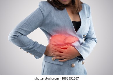The photo of liver on woman's body against gray background, Hepatitis, Concept with healthcare and medicine. - Shutterstock ID 1886551867