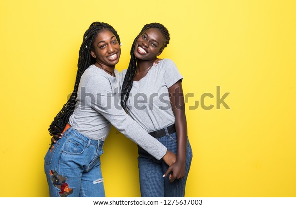 Photo Lovely African Womens Stand Closely Stock Photo 1275637003 ...