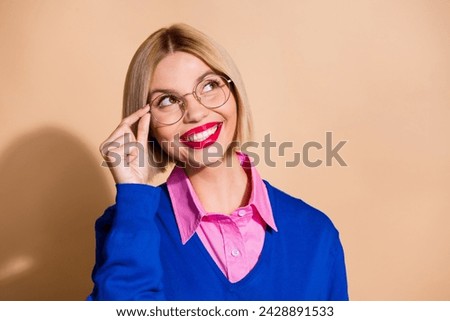 Photo of lovely creative minded lady arm touch eyeglasses look empty space contemplate isolated on beige color background