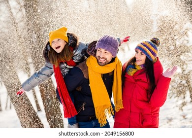 Photo Of Lovely Family Happy Positive Smile Mommy Daddy Daughter Piggyback Hands Wings Fly Snowy Outdoors