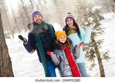 Photo of lovely family happy positive smile rejoice fly air fall snow frost winter vacation trip walk park