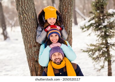 Photo of lovely family happy positive smile enjoy time together weekend walk snowy park winter frost