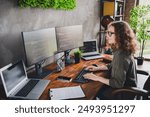 Photo of lovely nice successful woman coder hacker sitting working armchair comfortable workspace workstation indoors