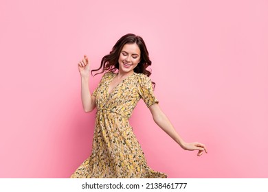 Photo of lovely positive girl enjoy dancing free time weekend isolated on pink color background - Powered by Shutterstock