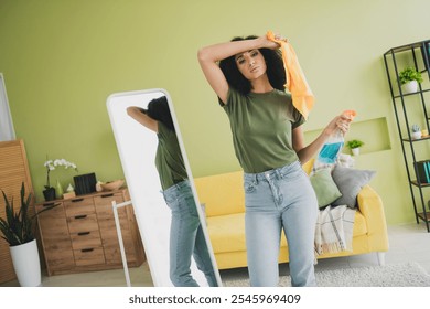 Photo of lovely young girl tired housecleaning mirror dressed green garment spacious house indoors room - Powered by Shutterstock