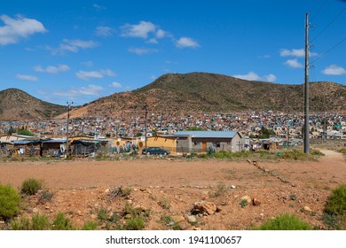 A Photo Of Low-cost And Informal Housing Situated Against A Hill In Robertson, South Africa.