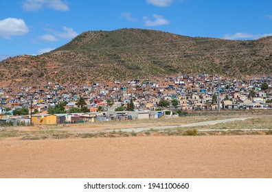 A Photo Of Low-cost And Informal Housing Situated Against A Hill In Robertson, South Africa.