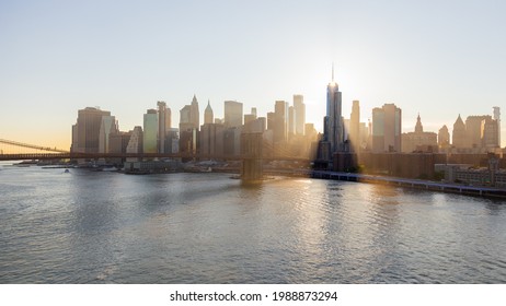 Photo of lower Manhattan during sunset taken from the Manhattan Bridge