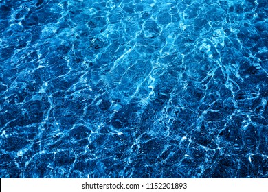 Photo of a macro bubbling blue clear sea water