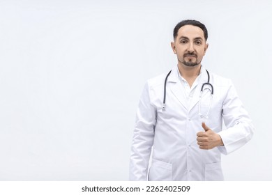 Photo of male mature doctor posing at camera with a stethoscope. - Shutterstock ID 2262402509