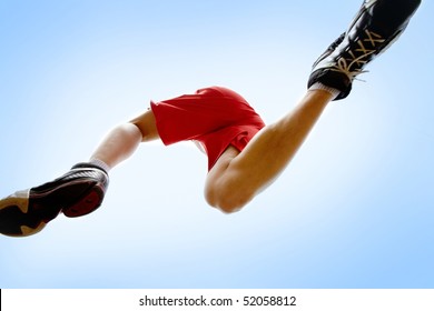 Photo Of Male Runner With Blue Sky Above