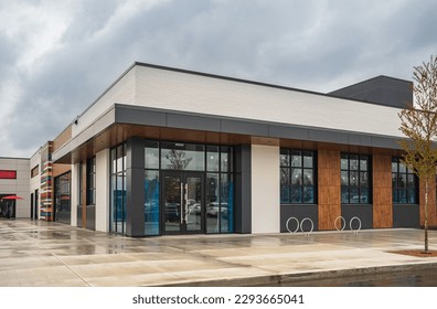 Photo of the mall shopping street in North America. Exterior of a new shopping centre building. Mall complex outdoor. Nobody, street photo - Shutterstock ID 2293665041