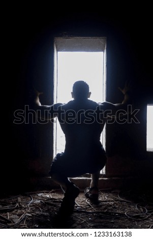 Similar – man leaning on window