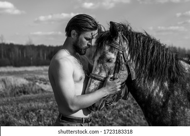 photo of a man with horse - Powered by Shutterstock