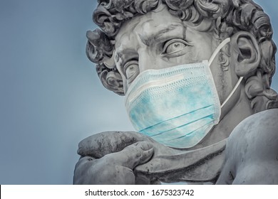 Photo manipulation about Michelangelo's David statue (Florence, Italy) protecting himself from coronavirus (COVID-19) with a surgical mask