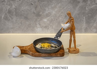 A photo of a Mannequin  cocking fried egg on a pan with isolated background 