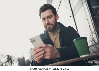 Photo of mature attractive man dressed stylish outfit enjoying weekend relax rest free time spring outside - Powered by Shutterstock