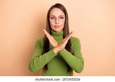 Photo Of Mature Bossy Lady Show No Wear Eyewear Green Sweater Isolated On Beige Color Background