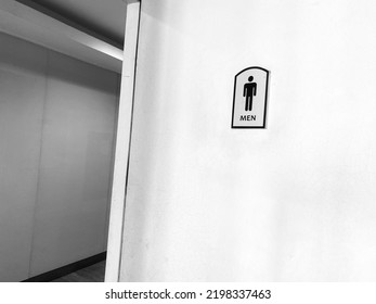 Photo Of The Men's Bathroom Sign On The Door.