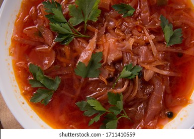 photo for menu, Ukrainian and Russian traditional beetroot soup - borscht with sour cream garlic pepper and sauce, Ukrainian borscht with sour cream, food background, Food and health - Shutterstock ID 1711410559