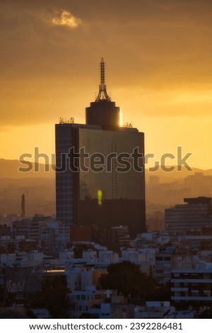 Photo of Mexico City World Trade Center WTC at sunset with the mountain range behind
