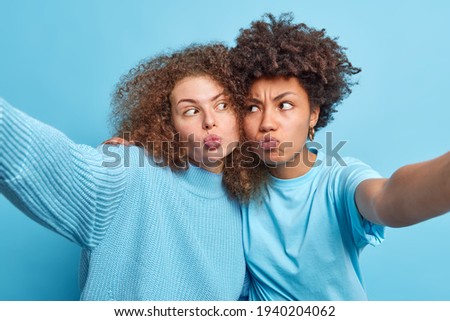 Similar – Image, Stock Photo woman making cuddles to her cute dog sleeping on bed