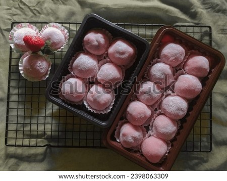 A photo of moci daifuku, which is a dessert placed on a plate Foto d'archivio © 