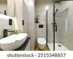 Photo of modern small bathroom with cashmere cabinets, LED-lit mirror, wall-hung toilet and shf modern small bathroom with cashmere cabinets, LED-lit mirror, wall-hung toilet and shower cubicle