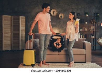 Photo Of Mom Dad Daughter Baby Car Seat Hold Baggage Passport Covid Certification Can Travel Abroad Night Late Dark Indoors Room