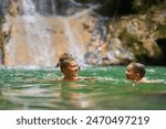 Photo of mother with son in Gozalandia Waterfalls