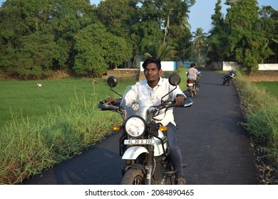  Photo Of A Motorcycle Rider Posing While Riding, Without Helmet. Location: Kerala, India Date 21-10-2020.