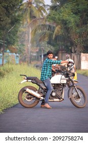  Photo Of A Motorcycle Rider Posing While Riding, Without Helmet. Location: Kerala, India Date 21-10-2020.